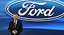 Ford slashes debt, outpaces GM