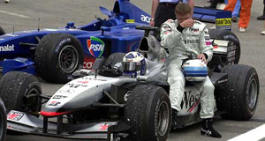 Hakkinen robbed as Schumacher inherits win